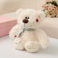 White teddy bear plush toy wearing a green knit scarf with red heart embroidery details - White Bear / 27cm