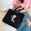 Black canvas tote bag for women featuring cute cartoon girl and cat graphic print - Happy Girl - Black