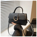 Detail of minimalist black crossbody bag with structural U-shaped gold hardware buckle - Black