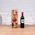 Christmas kraft paper wine bag with Santa Claus illustrations on a rustic table - Classic Santa Claus