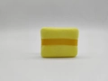Square yellow flocked makeup puff with soft velvet texture and matching finger ribbon strap - Yellow