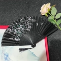 Classic black folding fan with purple floral patterns and a decorative black tassel - Cherry Blossom Language - Black Handle