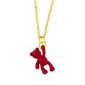 Detail of a matte dark red bear pendant hanging on a delicate minimalist gold chain - Red