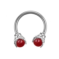 Detail of horseshoe ring with dragon claws holding translucent red beads in medical steel - Silver Eagle Claw Red Agate Style Bead