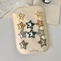 Set of 10 glitter star hair clips for girls in cream, blue, and grey on display card - Blue Star Style