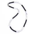 Macro detail of 6mm matte black and white map stone beaded necklace with silver spacers - Matte + White Turquoise Necklace