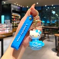 Blue Hello Kitty in a teacup keychain with a silicone wrist strap and gold ring. - Blue Cup Hello Kitty (B474-4) / Single Piece