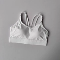 White high-impact sports bra with cross-back thin straps and wide elastic underband - S / Tops / White