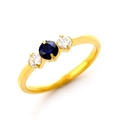 Three-stone titanium steel gold ring with round blue sapphire and white zircon accents - Gold Blue And White Diamonds