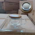 Heat-resistant glass tea mug with bamboo lid and glass infuser on a package box - Three-piece Set (Bamboo Wrapped Stainless Steel)