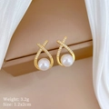 Detail of gold pearl earrings with crisscross design and sparkling zircon insets - Earrings-C142 (S925 Silver Needle Copper Gold Plated)