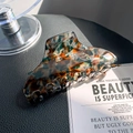 Large acetate hair claw clip featuring a multi-color emerald and amber marble pattern - Tea Brown 10cm