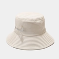 Detail of cream cotton bucket hat featuring a rhinestone safety pin and flower embroidery - Beige