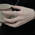 Bague en dentelle argentée ajourée avec micro-zircons pour un style élégant et chic - Bague Style Dentelle en Zircone