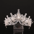 Detailed macro view of silver bridal crown featuring sparkling rhinestones and pearls - Large Handmade V-Shaped Silver With White Rhinestone