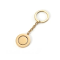Detail of a rotating gold stainless steel circular pendant keychain with smooth finish - Gold Keychain