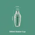 500ml transparent shaker cup with measurement markings and strainer on green background - 500ml 4-Section Shaker Cup