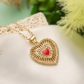 Gold heart pendant necklace with red enamel and sparkling zircon accents on silk background - Clear Zirconia Style