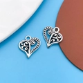Set of two silver heart-shaped charms with hollow spiral pattern for DIY jewelry making - 1pc Antique Silver Hollow Heart 13x12mm