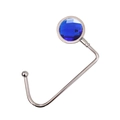 Detail of metal bag hook with a sparkling blue crystal inlay for desk or table - Royal Blue