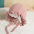 Pink knit baby bonnet with ruffled lace trim and chin straps for infants - Pink - Not Lined