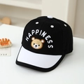 Detail of kids baseball cap featuring brown bear embroidery and HAPPINESS text design - 50cm / Black
