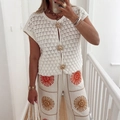 White short-sleeved knit cardigan featuring unique gold sun-shaped buttons for women - S / White