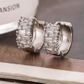 Macro detail of silver hoop earrings featuring baguette and round cubic zirconia pavé - Micro Pave Hoop Earrings (D9328) / Silver