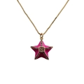 Detail of gold star necklace featuring pink pendant with center gem and colorful halo - Pink