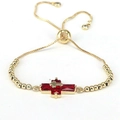 Bracciale regolabile con perline dorate con croce in zircone rosso e chiusura a scorrimento - Rosso