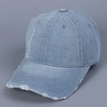 Close-up of distressed denim baseball cap with frayed holes and vintage texture details - M (56-58cm) / Light Blue