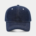 Detail of dark blue denim baseball cap with contrast white stitching and curved brim - Adjustable / Dark Blue