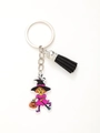Close-up of Halloween acrylic keychain with cartoon witch, pumpkin and black tassel - Cartoon Witch (20626)