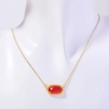 Gold birthstone necklace featuring a red oval crystal pendant on a white mannequin - July Necklace