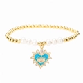 Gold beaded heart evil eye bracelet with white pearls and blue enamel charm - Blue