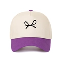 Detail of a color-block baseball cap featuring a bow pattern and contrast purple brim - Adjustable / Purple