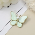 Elegant gold butterfly brooch with light green wings and a white pearl accent - Single Item / Mint Green
