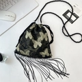 Detailed golden butterfly embroidery and bead fringe on a black drawstring crossbody bag - Golden Butterfly Embroidery