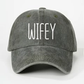 Detailed front view of washed dark grey baseball cap with bold white WIFEY text print - Army Green