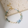 Handmade pearl bracelet with light blue gravel and gold metal beads on stone - Irregular Aquamarine Pearl Bracelet
