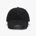 Distressed black cotton baseball cap with vintage frayed holes and curved brim design - Black