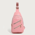 Pink pebbled leather sling bag with double zipper front pockets and gold hardware - Pink