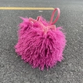 Pink faux sheepskin fur bucket bag with drawstring closure and Y2K aesthetic - Rose Red