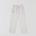 Detailed flat lay of off-white knitted joggers featuring elastic drawstring waist and logo - XS / Off White