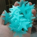 Hand holding small turquoise luminous star wall stickers for room decoration - 100 Pieces / 3.8cm/Glow / Blue