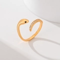 Gold plated snake ring featuring clear zircon tail and black gemstone eyes on white - Snake Shape Design (JZ029)