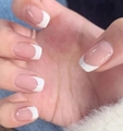 Detailed view of classic French style press-on nails with pink base and white tips - Short Square Nude Pink White French (CW841)