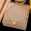 Double-layered golden butterfly anklet with white shell inlay on a jewelry box - B5002 Double Layer White Shell Butterfly