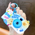 Porte-clés créatif en caoutchouc souple en forme de caméra Capybara bleu mignon - Caméra Projecteur Kapibala - Bleu