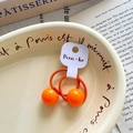 Cute vibrant orange double-bead hair ties for girls in a stylish aesthetic setting - Orange